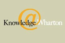 Logo featuring the text "Knowledge@Wharton" with an orange at-symbol integrated, representing the Wharton School''s business insights platform.