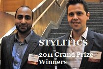 Two people in formal attire stand in front of a staircase with text overlay that reads "Stylitics 2011 Grand Prize Winners."