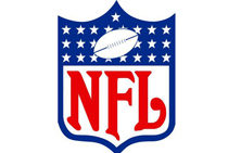 The image depicts the NFL logo, featuring a shield with stars, a football, and the letters "NFL" in red. It represents the National Football League.